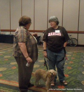 Babs Albon and Kathy McNett at the SAMHSA Regional Conference. We need more mental health research on service animals.